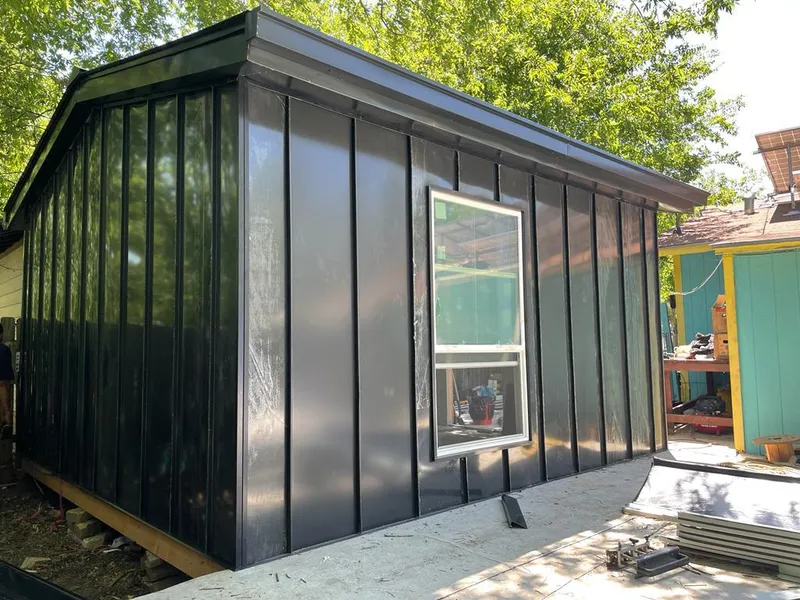 Black standing seam metal wall panels for Roof Inspection in Buckingham