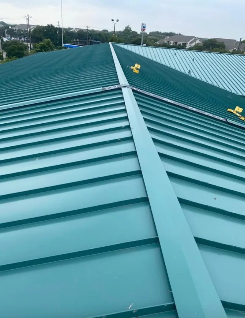 Green commercial metal roof ridge and valley for Metal Roof Repair in Buckingham